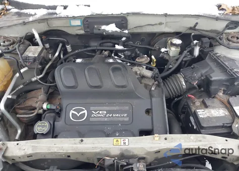 2004 Mazda Tribute Lx V6 z USA, uszkodzony, nr VIN 4F2YZ94154KM20279